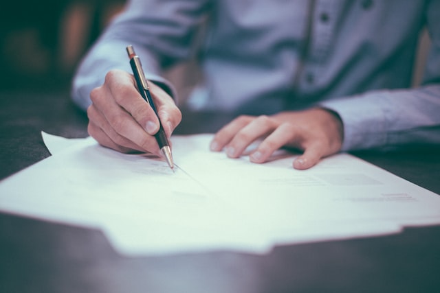 Financial advisor signing Estate planning documents