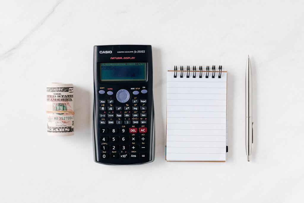 Retiree calculating his savings and return on investments